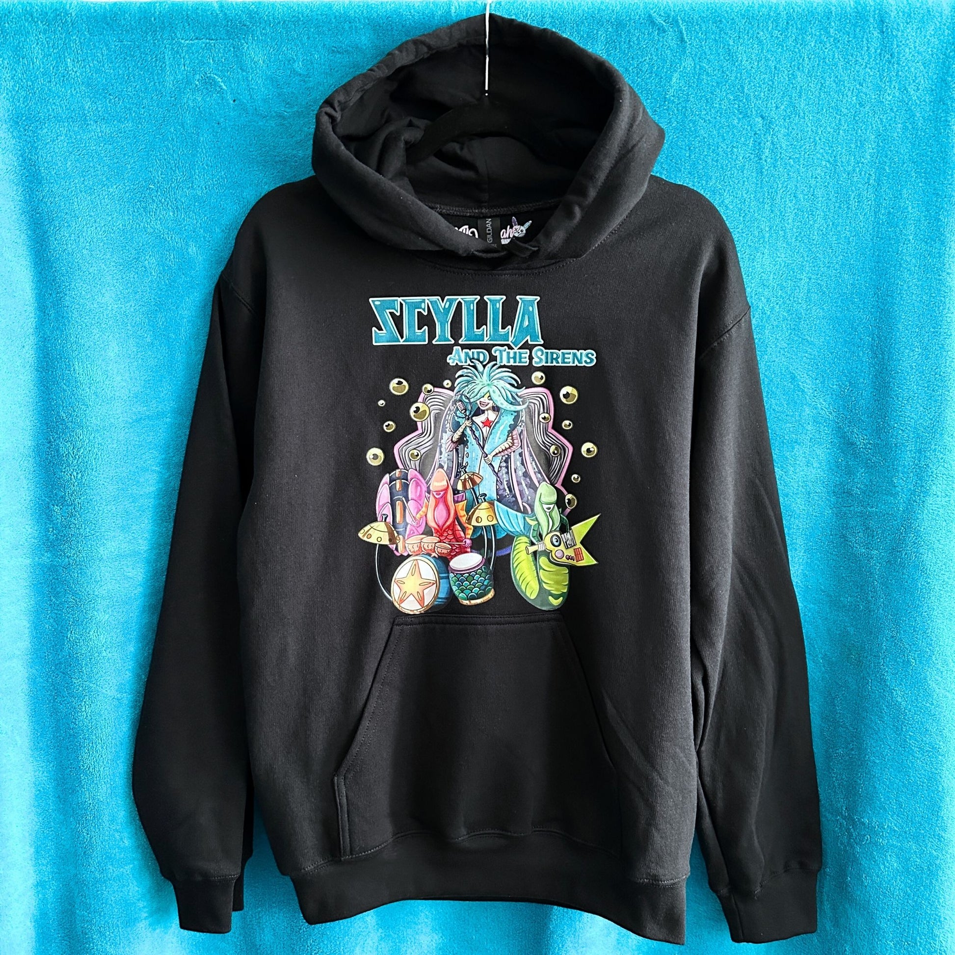 Black hoodie with 'Scylla and the Sirens' graphic design on a blue background