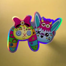 Load and play video in Gallery viewer, Holographic Decora Buns sticker - KillVannah x Gnarwhal Crochet collaboration

